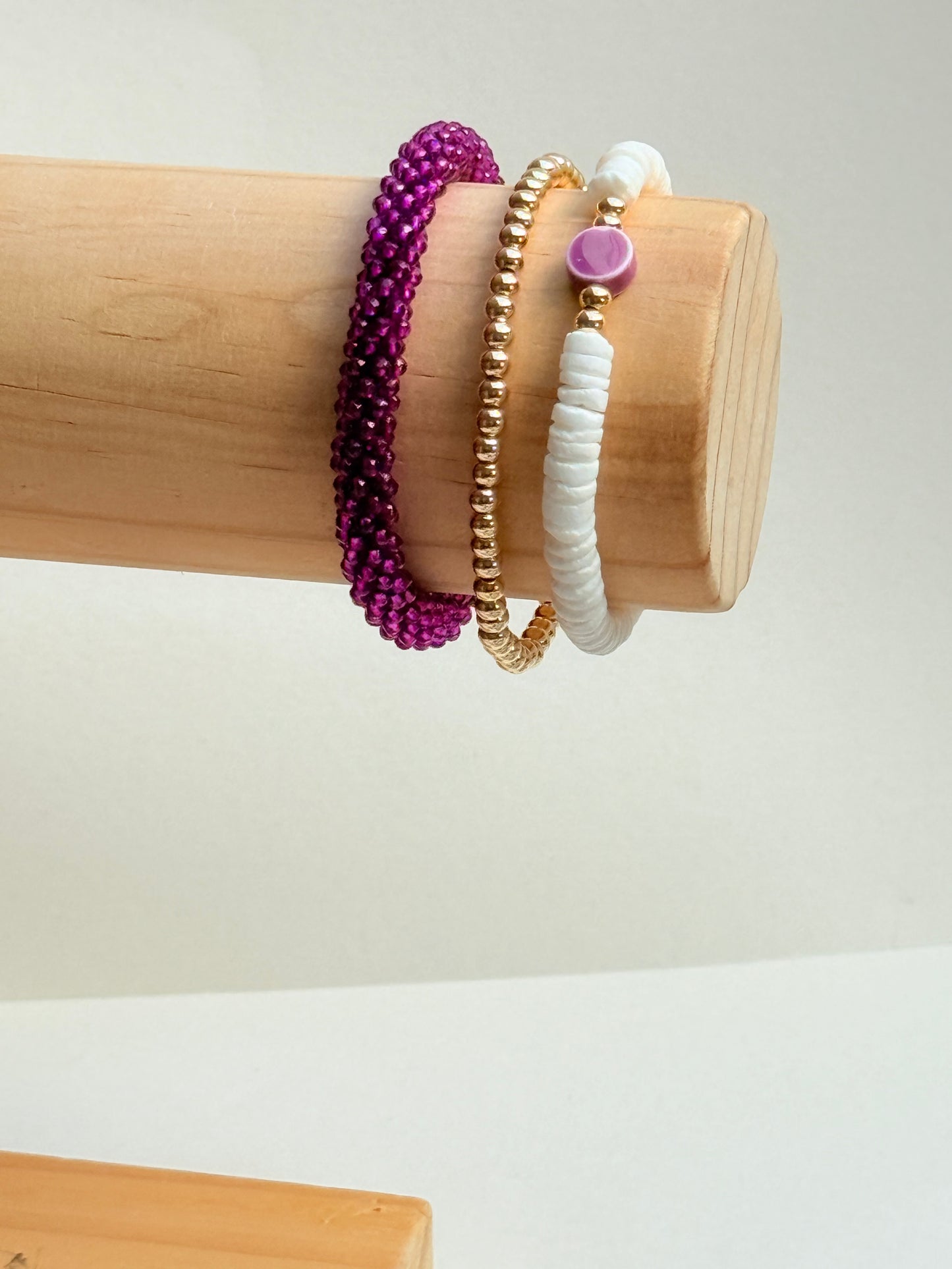 Coral shell with purple clay accent