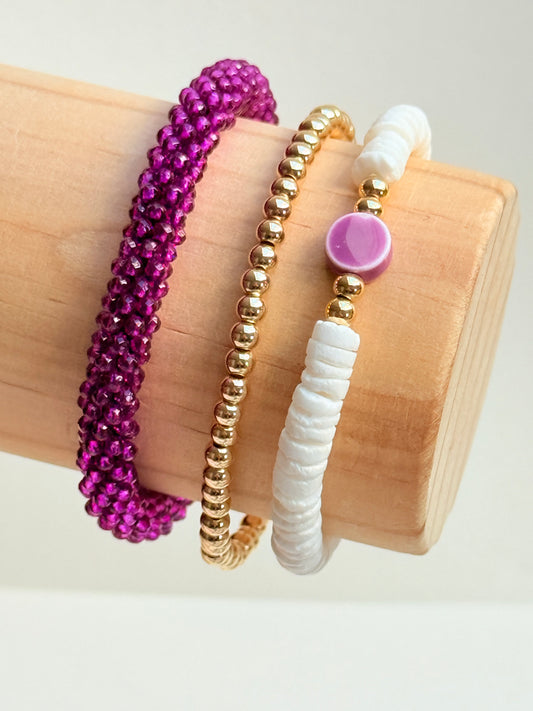 Coral shell with purple clay accent