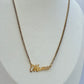 ‘Mama’ tennis necklace