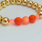 Gold acrylic & orange pop beaded bracelet