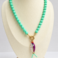 Seafoam green fish  necklace