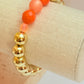 Gold acrylic & orange pop beaded bracelet