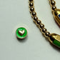 Gold beaded bracelet with charm bead