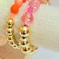 Gold acrylic & pink faceted bead bracelet