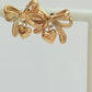 Gold  bow  stud