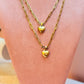 Gold link chain with heart charm