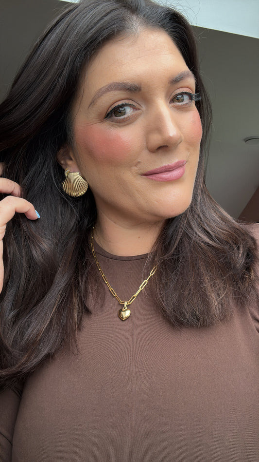 Gold link chain with heart charm