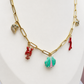 Gold link chain with beach charms