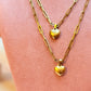 Gold link chain with heart charm
