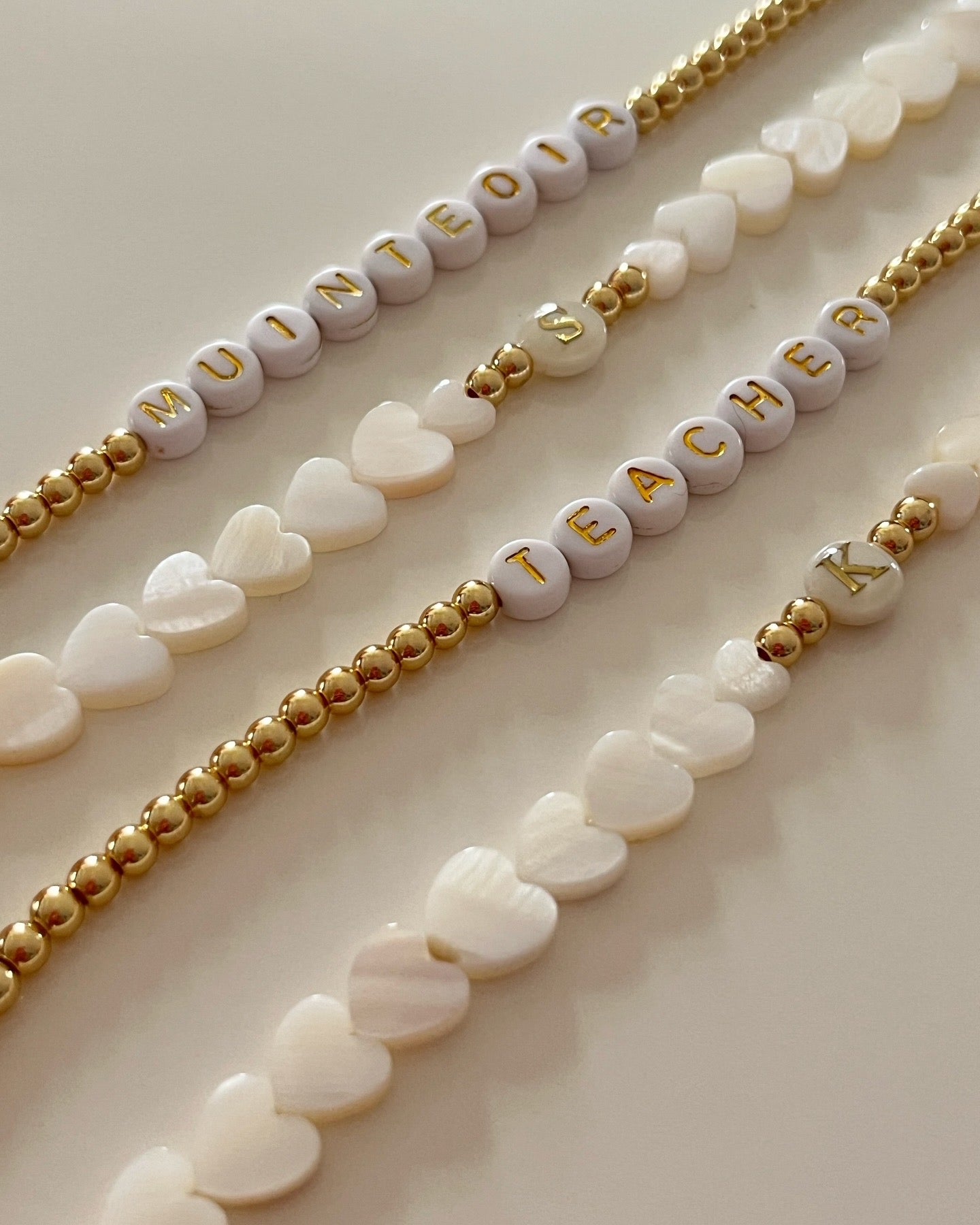 Heart shaped shell beads with shell intial