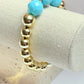 Gold acrylic & turquoise faceted bead bracelet