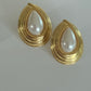 Pearl swirl earrings