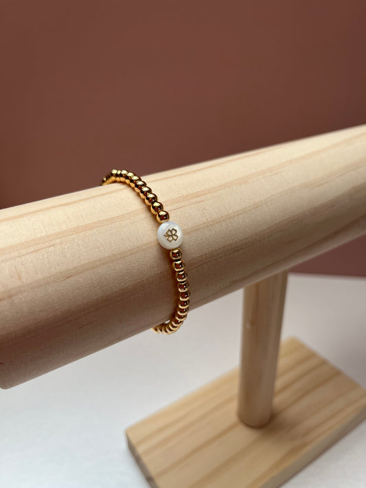 Gold beaded bracelet with Shell Initial